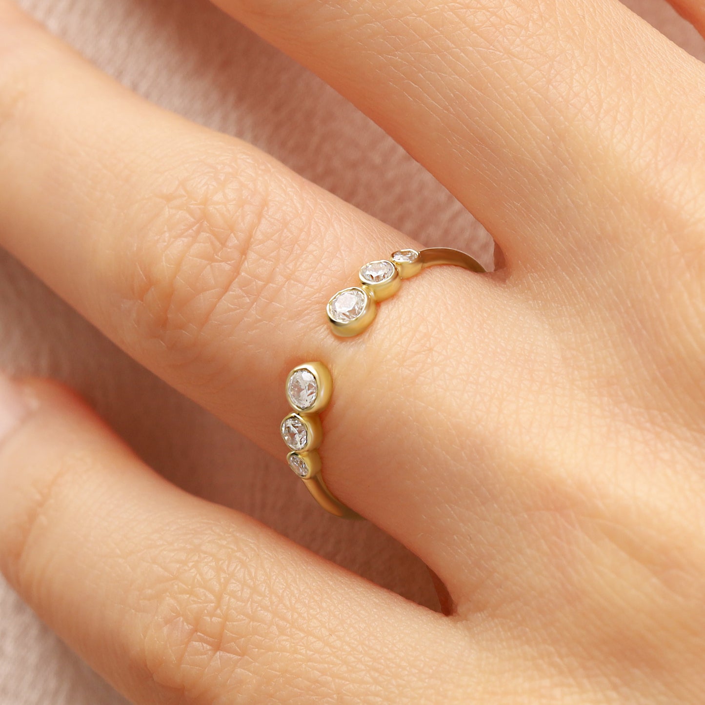 14K Open Gold Ring with Bezel-Set Zircon Stones