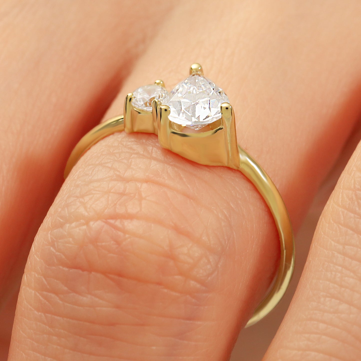 You & Me CZ Ring in 14K Gold – Pear & Round Stones
