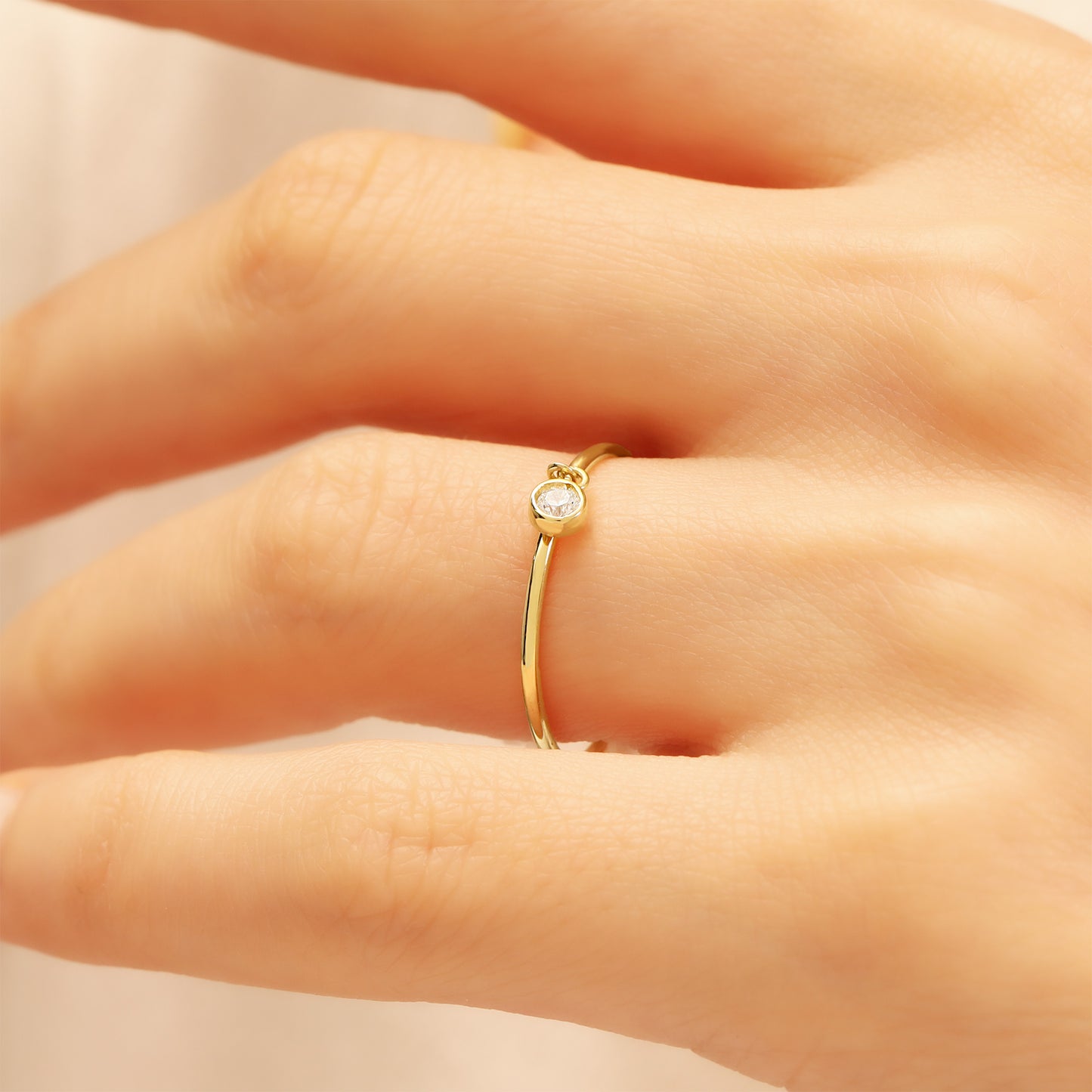 Minimalist 14K Gold Ring with Dangling Zircon