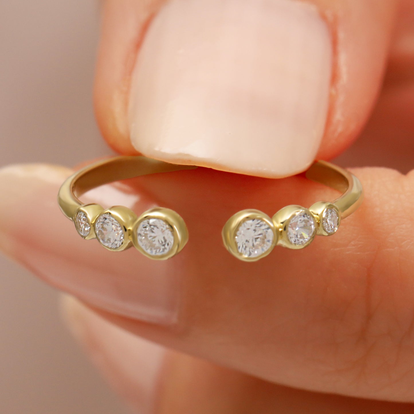 14K Open Gold Ring with Bezel-Set Zircon Stones
