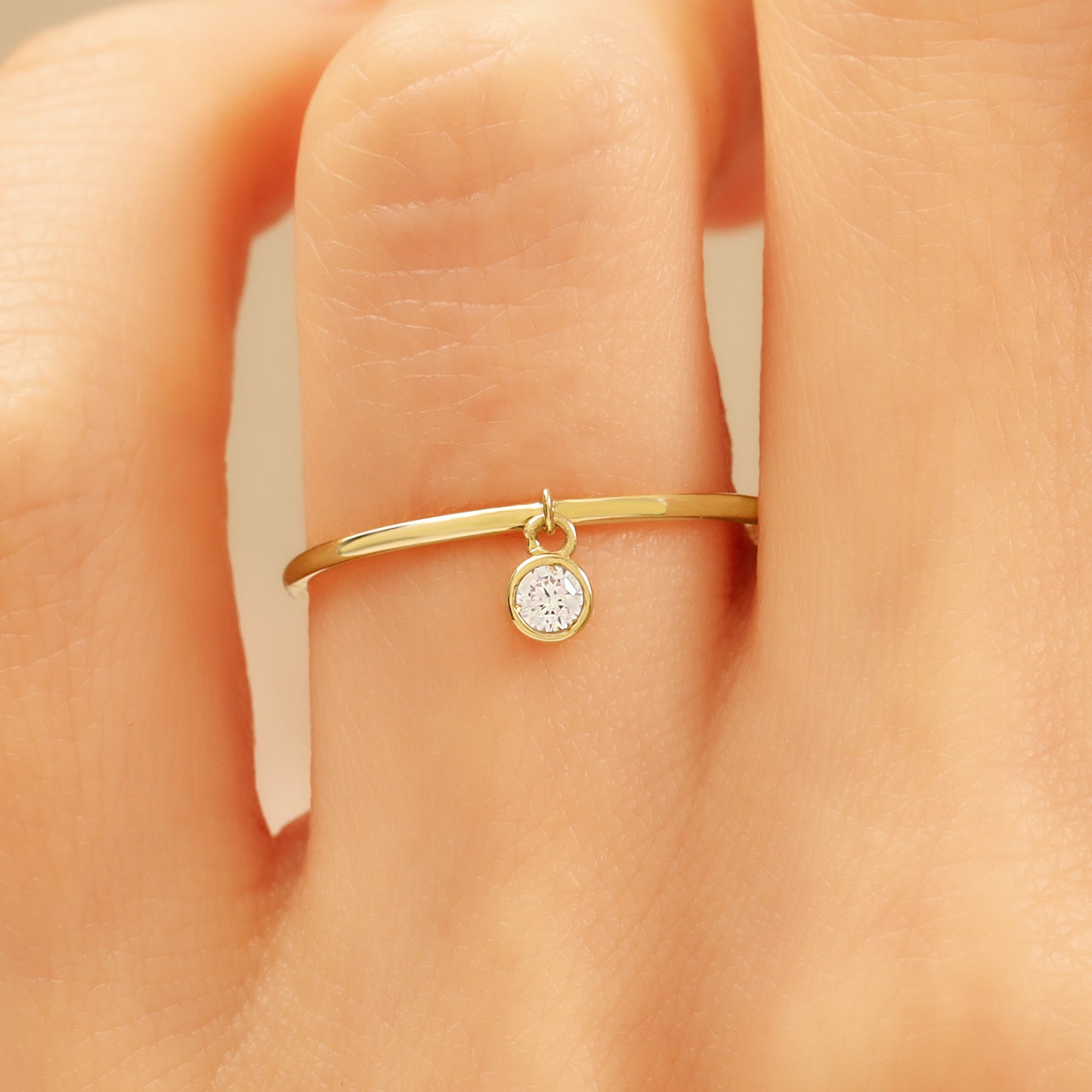Minimalist 14K Gold Ring with Dangling Zircon
