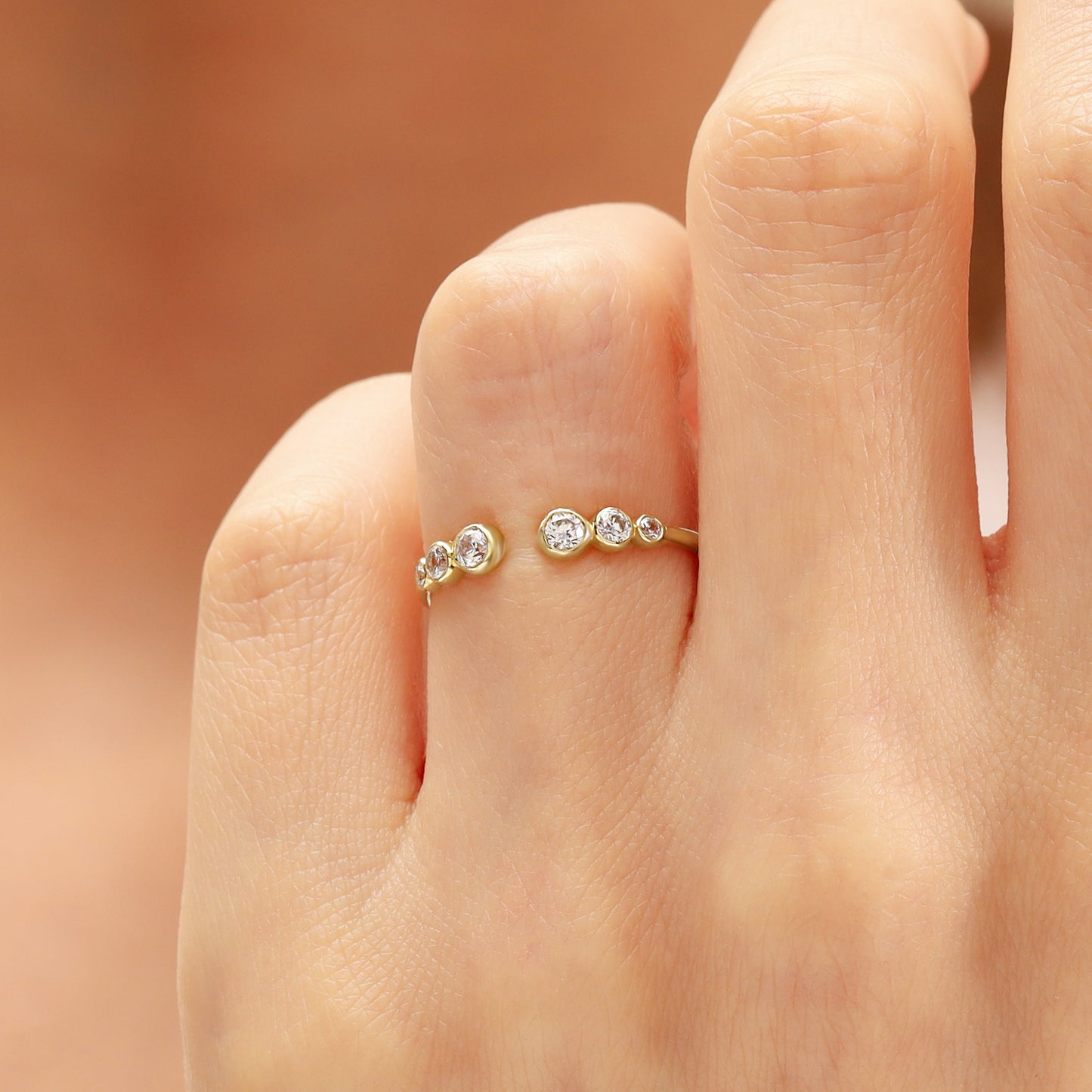 14K Open Gold Ring with Bezel-Set Zircon Stones
