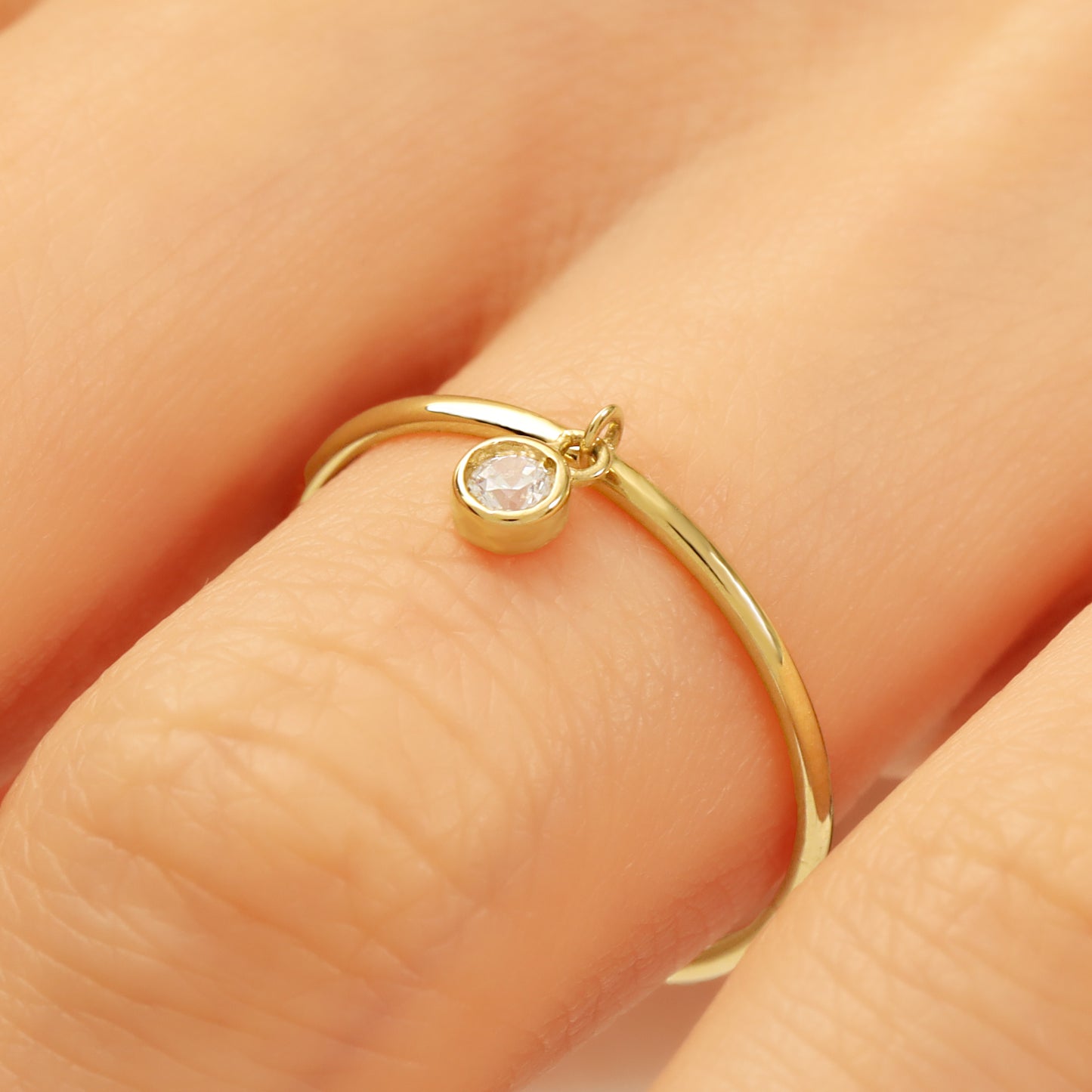 Minimalist 14K Gold Ring with Dangling Zircon