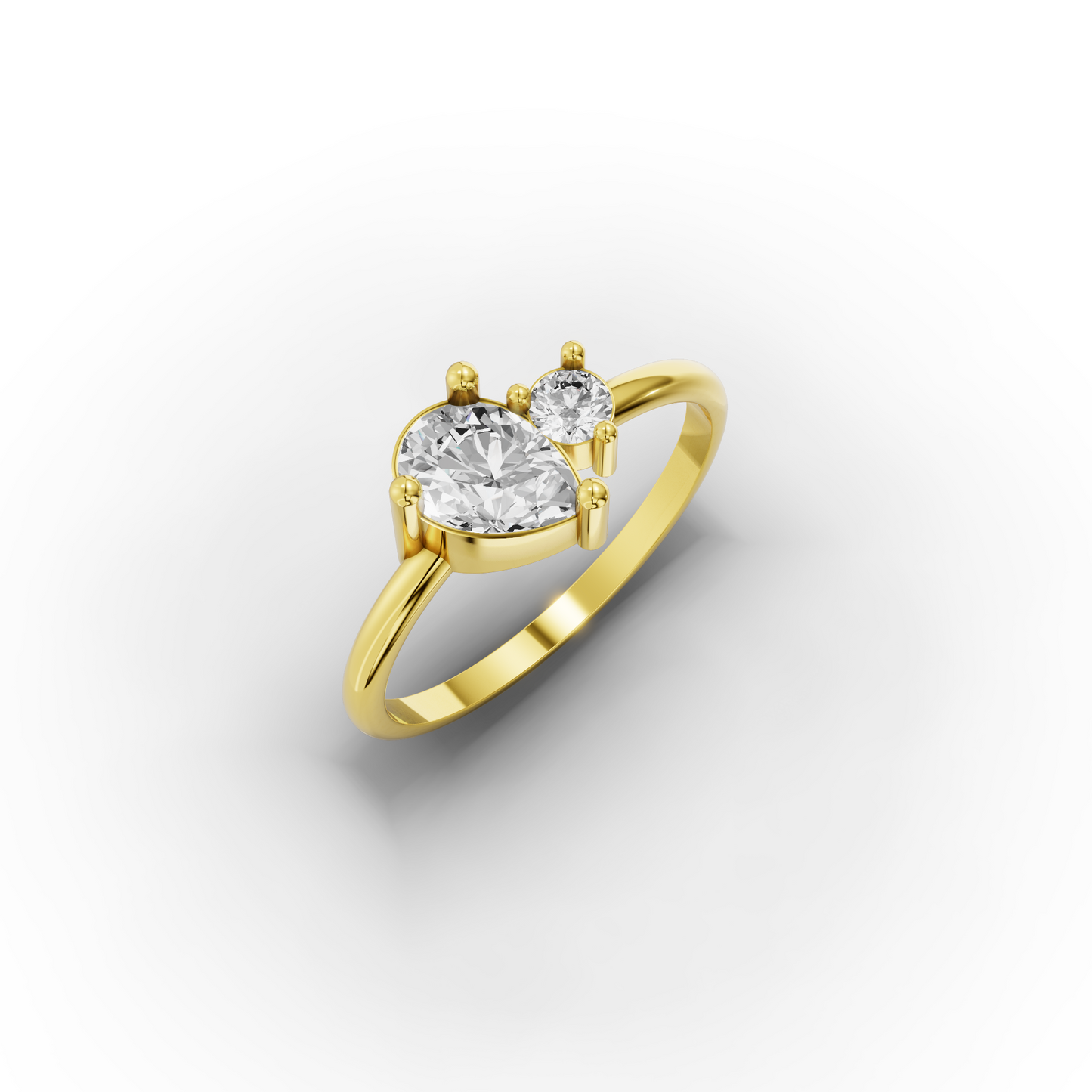 You & Me CZ Ring in 14K Gold – Pear & Round Stones