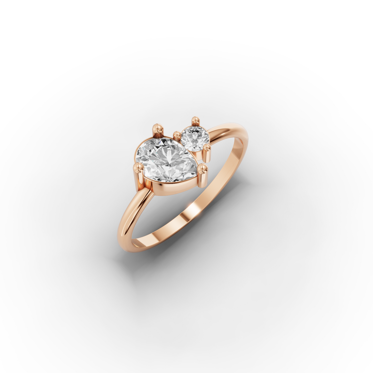 You & Me CZ Ring in 14K Gold – Pear & Round Stones