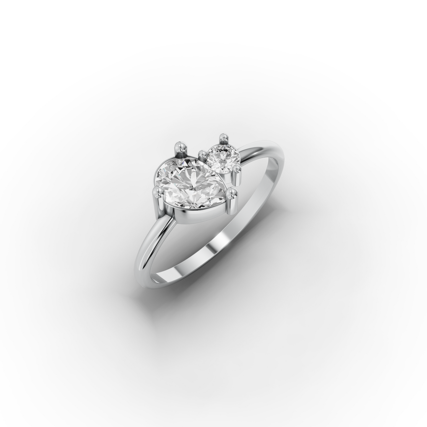 You & Me CZ Ring in 14K Gold – Pear & Round Stones