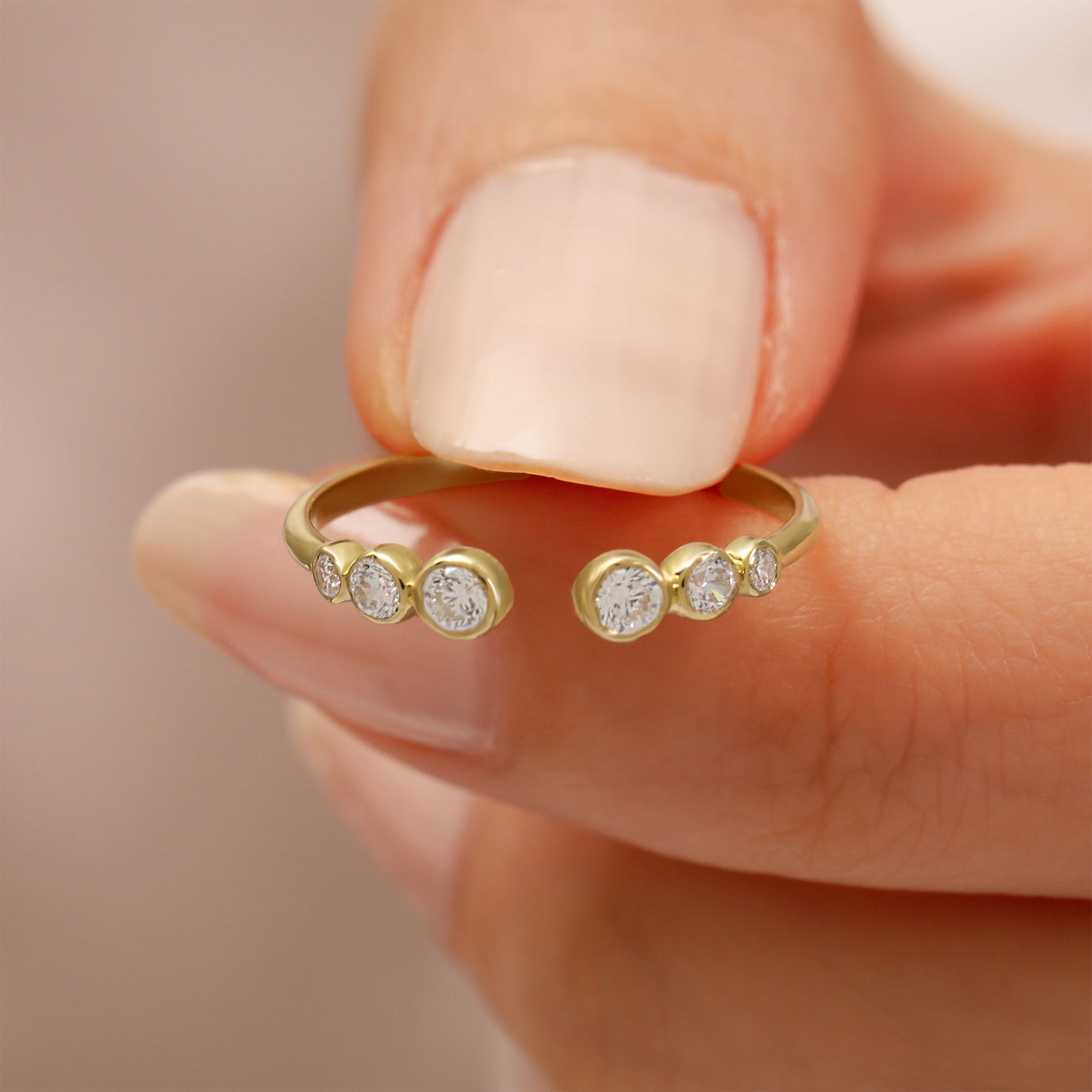 14K Open Gold Ring with Bezel-Set Zircon Stones