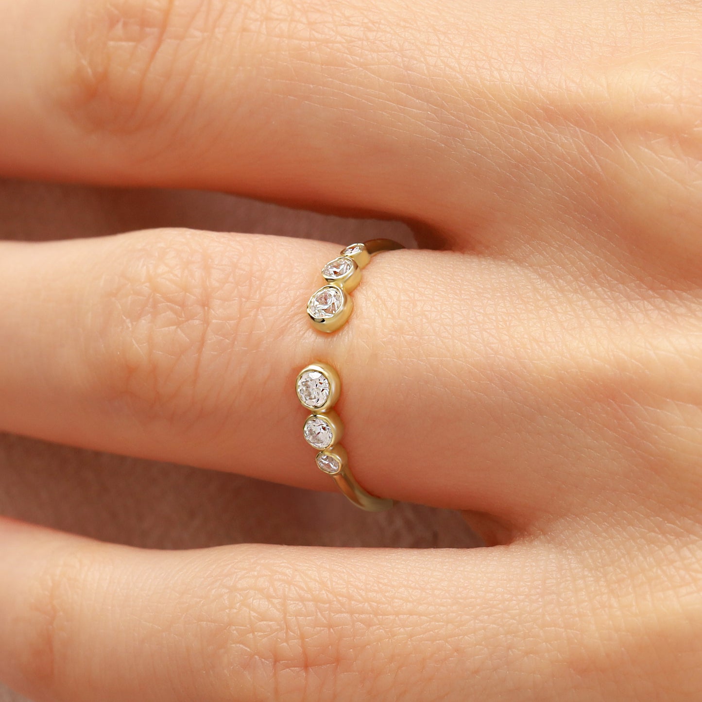 14K Open Gold Ring with Bezel-Set Zircon Stones